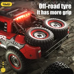 JJRC Q130 high grip off road tires placed at the back of the truck