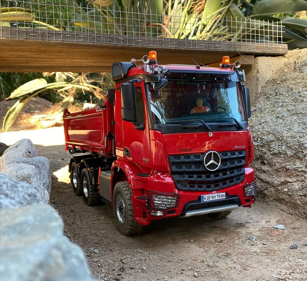 Red remote control Mercedes Arocs dump truck